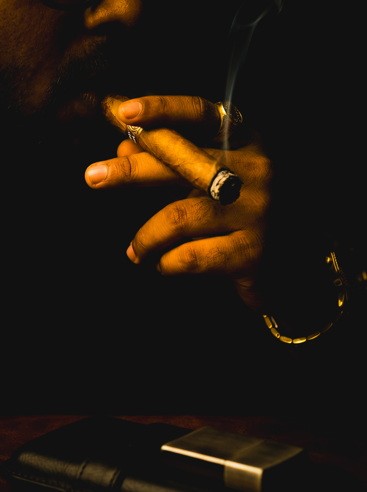 The Evening — cigar smoke rising in candlelight